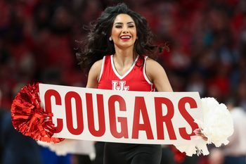 Feb 19, 2020; Houston, Texas, USA; Houston Cougars cheerleaders perform during the first half against the Tulsa Golden Hurricane at Fertitta Center. Mandatory Credit: Troy Taormina-Imagn Images