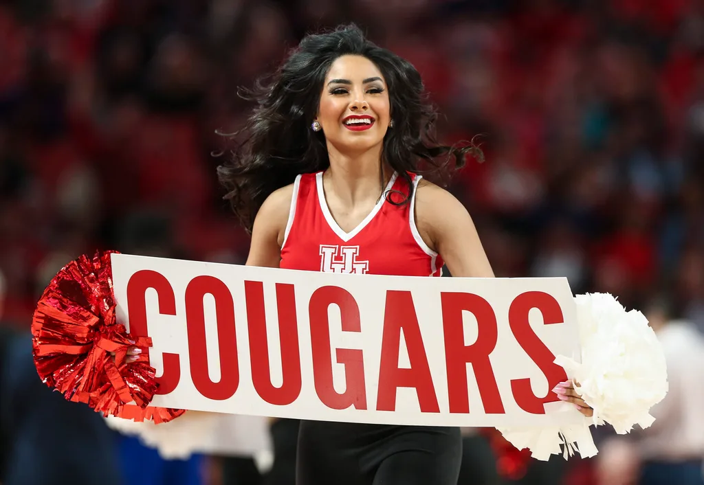 Feb 19, 2020; Houston, Texas, USA; Houston Cougars cheerleaders perform during the first half against the Tulsa Golden Hurricane at Fertitta Center. Mandatory Credit: Troy Taormina-Imagn Images