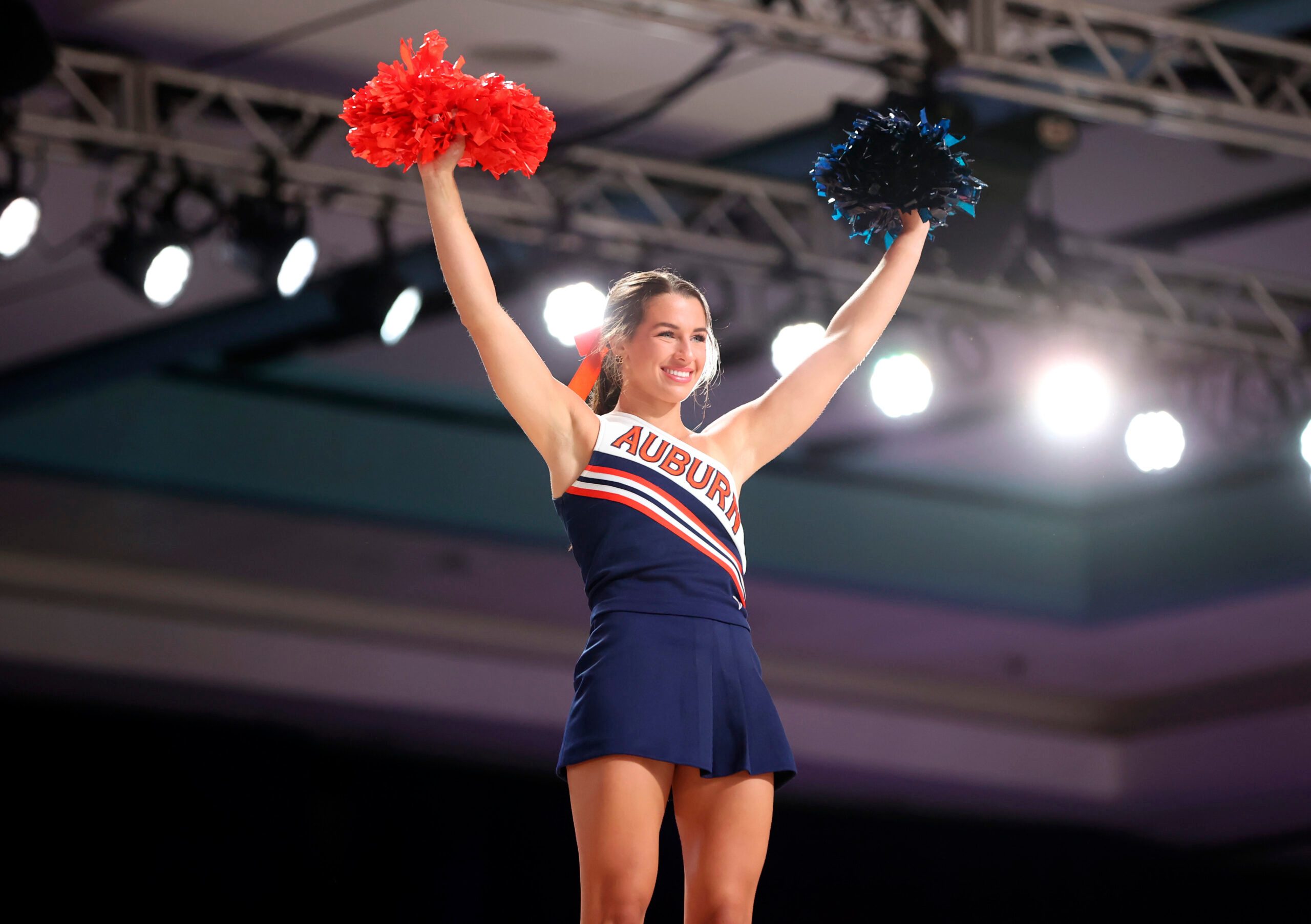 Nov 25, 2021; Nassau, BHS; Auburn Tigers cheerleader against the Loyola Ramblers during the first half in the 2021 Battle 4 Atlantis at Imperial Arena. Mandatory Credit: Kevin Jairaj-Imagn Images