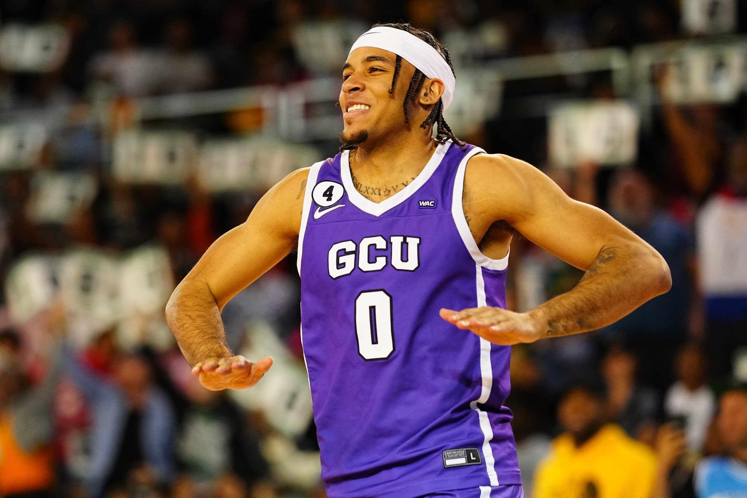 Mar 31, 2022; New Orleans, LA, USA; Grand Canyon University Antelopes Guard Sean Miller-Moore (0) reacts after dunking the ball at Convocation Center. Mandatory Credit: Andrew Wevers-Imagn Images