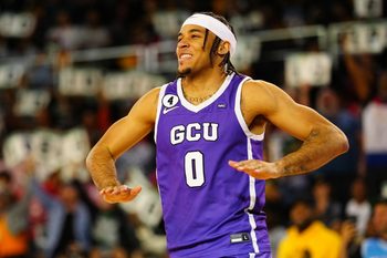 Mar 31, 2022; New Orleans, LA, USA; Grand Canyon University Antelopes Guard Sean Miller-Moore (0) reacts after dunking the ball at Convocation Center. Mandatory Credit: Andrew Wevers-Imagn Images