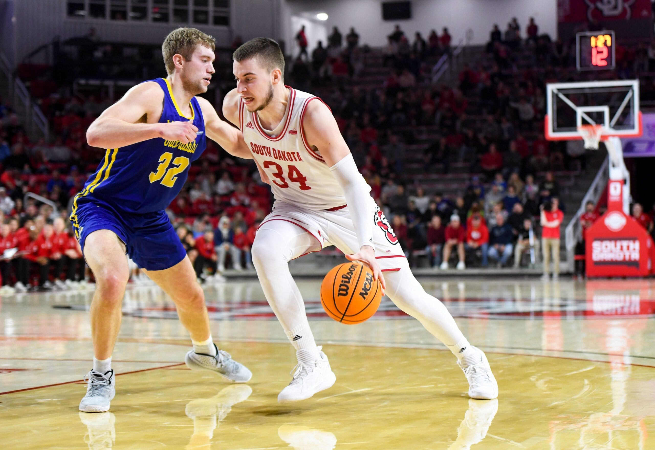 South Dakota State   s Matt Dentlinger guards South Dakota   s Tasos Kamateros in a rivalry matchup on Saturday, January 14, 2023, at the Sanford Coyote Sports Center in Vermillion.

Men Rivalry Bball 017