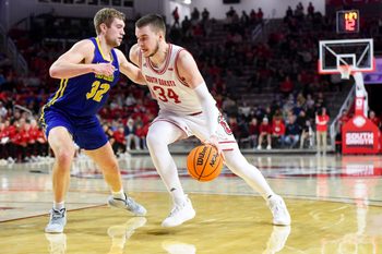 South Dakota State   s Matt Dentlinger guards South Dakota   s Tasos Kamateros in a rivalry matchup on Saturday, January 14, 2023, at the Sanford Coyote Sports Center in Vermillion.

Men Rivalry Bball 017