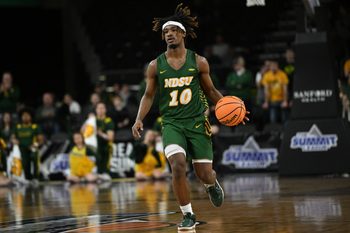 Mar 7, 2023; Sioux Falls, SD, USA;  North Dakota State Bison guard Damari Wheeler-Thomas (10) dribbles against the Oral Roberts Golden Eagles in the first half at Denny Sanford Premier Center. Mandatory Credit: Steven Branscombe-Imagn Images