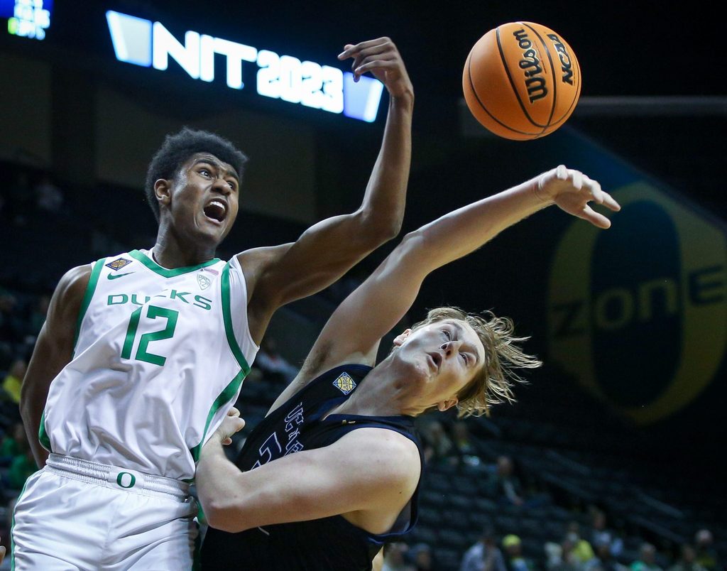 Oregon forward James Cooper leaps for a rebound as the Oregon Ducks take on UC Irvine in their NIT opener Wednesday, March 15, 2023, at Matthew Knight Arena in Eugene, Ore.
Ncaa Basketball Oregon Men S Basketball Nit Opener Uc Irvine At Oregon