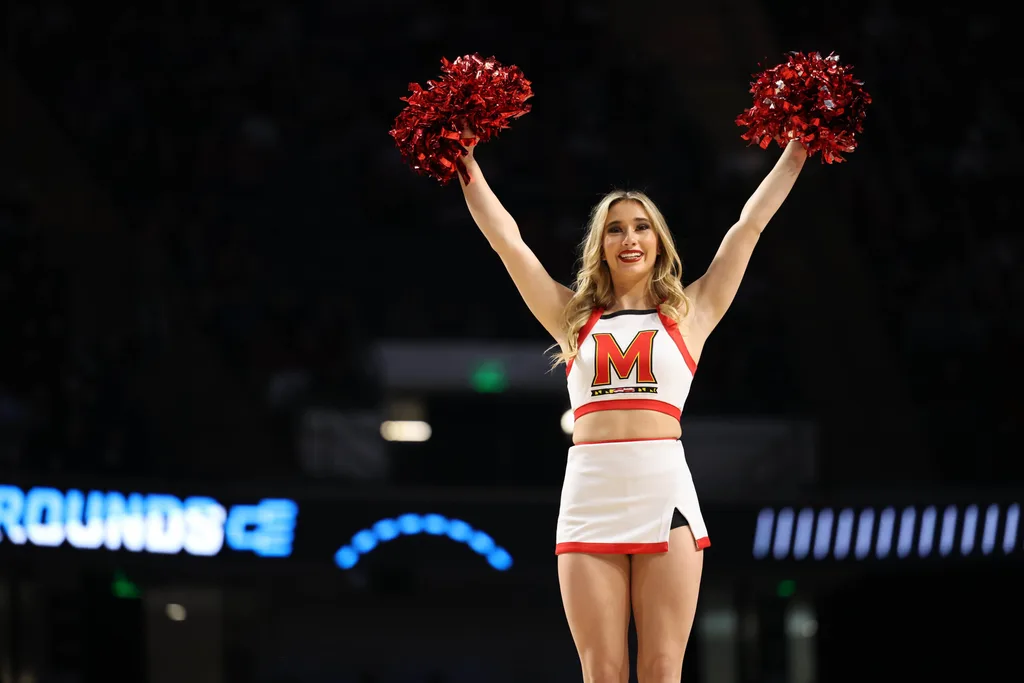 Mar 16, 2023; Birmingham, AL, USA; Maryland Terrapins cheerleader performs against the West Virginia Mountaineers during the first half in the first round of the 2023 NCAA Tournament at Legacy Arena. Mandatory Credit: Vasha Hunt-Imagn Images
