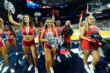 Apr 1, 2023; Houston, TX, USA; Florida Atlantic Owls cheerleaders perform in the semifinals of the Final Four of the 2023 NCAA Tournament against the San Diego State Aztecs at NRG Stadium. Mandatory Credit: Robert Deutsch-Imagn Images
