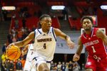 UTEP's Corey Camper Jr. (4) attempts to dribble past Louisiana Tech's Amaree Abram (1) at the Don Haskins Center in El Paso, Texas, on Jan. 2, 2025.