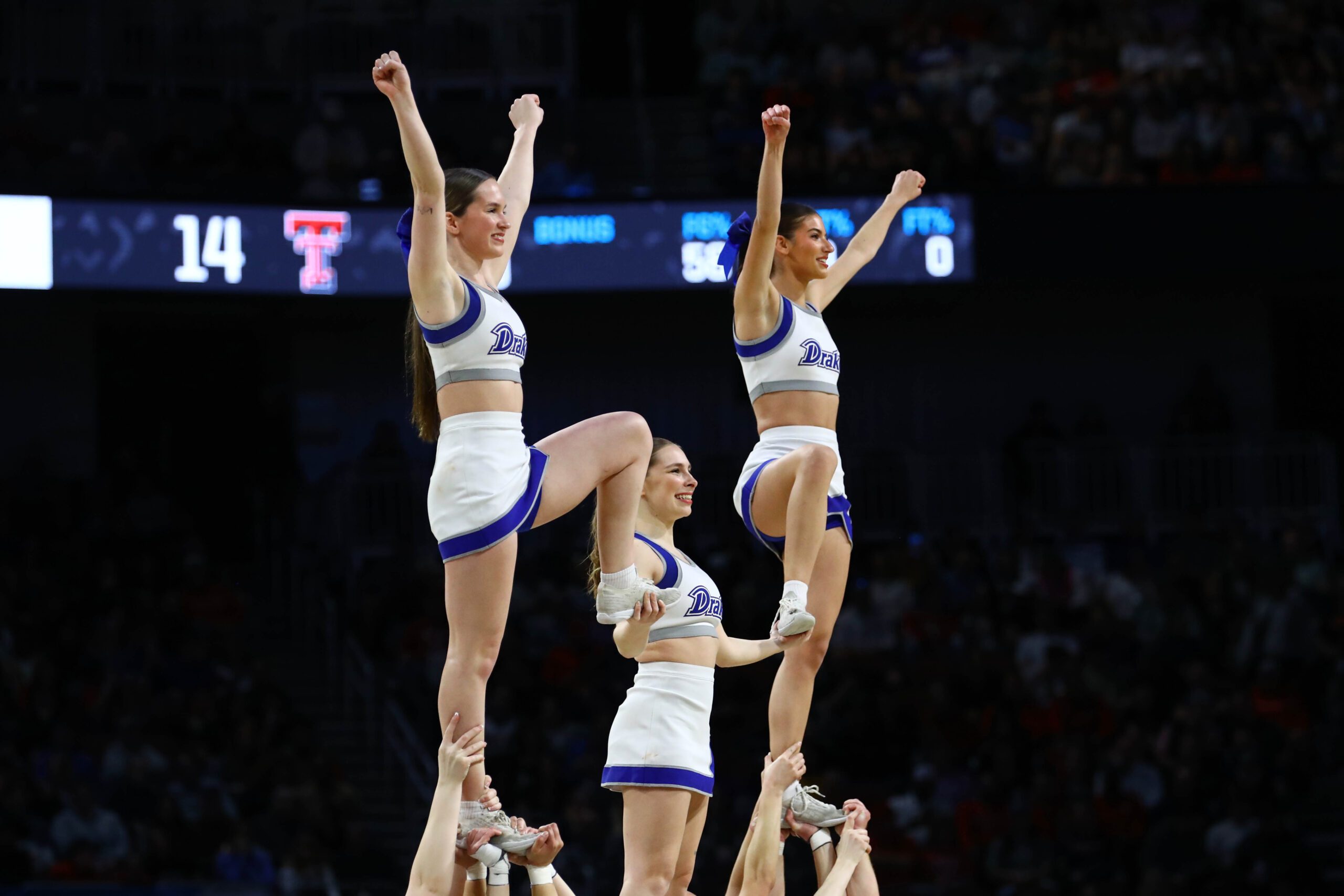 Mar 22, 2025; Wichita, KS, USA; Drake Bulldogs cheerleaders perform during the first half at Intrust Bank Arena. Mandatory Credit: Nick Tre. Smith-Imagn Images