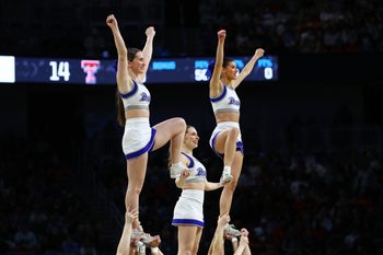 Mar 22, 2025; Wichita, KS, USA; Drake Bulldogs cheerleaders perform during the first half at Intrust Bank Arena. Mandatory Credit: Nick Tre. Smith-Imagn Images