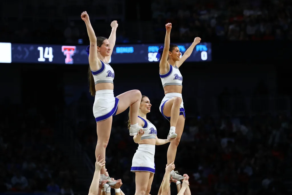 Mar 22, 2025; Wichita, KS, USA; Drake Bulldogs cheerleaders perform during the first half at Intrust Bank Arena. Mandatory Credit: Nick Tre. Smith-Imagn Images