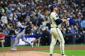 Oct 13, 2025; Milwaukee, Wisconsin, USA: Milwaukee Brewers relief pitcher Chad Patrick (39) reacts after giving up a home run to Los Angeles Dodgers first baseman Freddie Freeman (5) during the sixth inning during game one of the NLCS round for the 2025 MLB playoffs at American Family Field. Mandatory Credit: Benny Sieu-Imagn Images