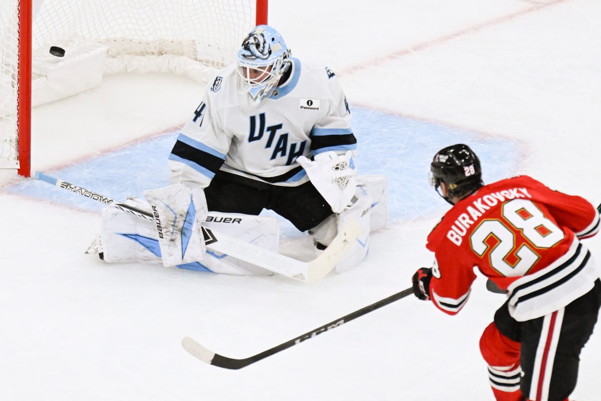Oct 13, 2025; Chicago, Illinois, USA;  Chicago Blackhawks left wing Andre Burakovsky (28) scores past Utah Mammoth goaltender Vitek Vanecek (41) during the third period at United Center. Mandatory Credit: Matt Marton-Imagn Images