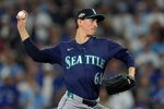 Oct 20, 2025; Toronto, Ontario, CAN; Seattle Mariners pitcher George Kirby (68) pitches against the Toronto Blue Jays in the first inning during game seven of the ALCS round for the 2025 MLB playoffs at Rogers Centre. Mandatory Credit: John E. Sokolowski-Imagn Images