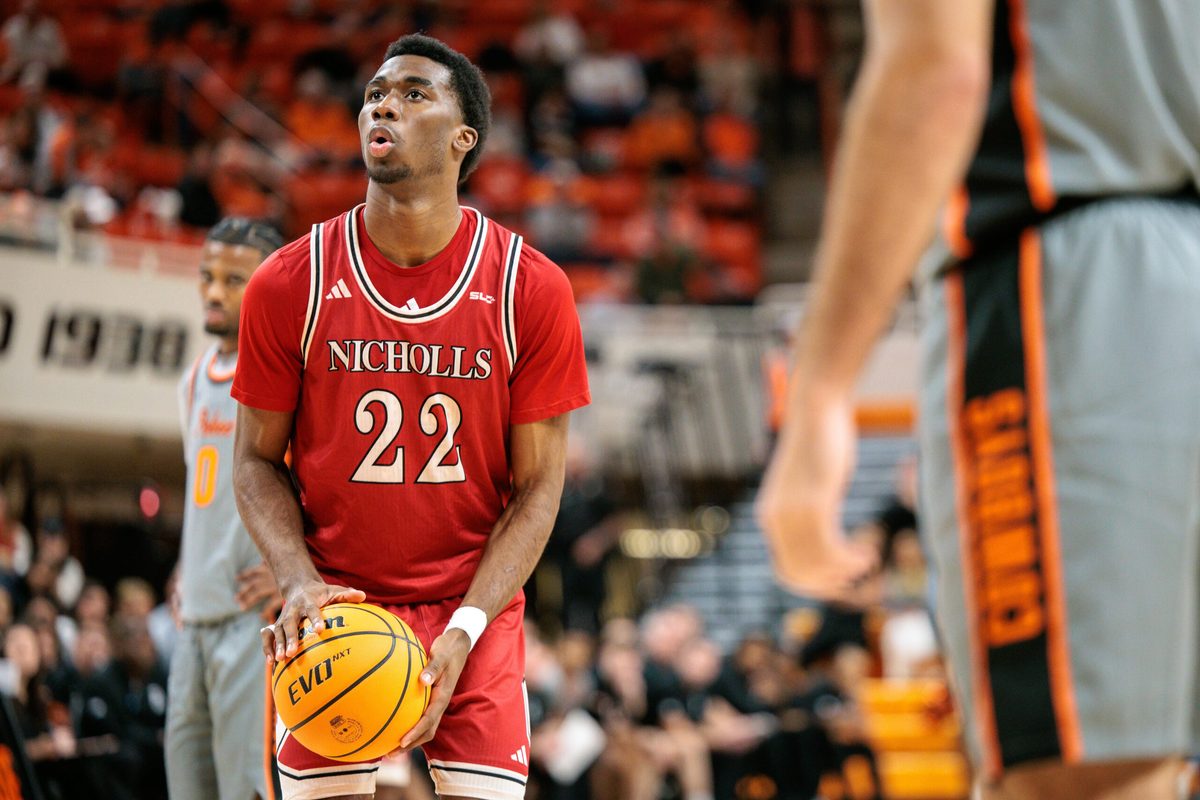Nov 22, 2025; Stillwater, Oklahoma, USA; Nicholls Colonels guard Jalik Dunkley (22) shoots a free throw during the second half against the Oklahoma State Cowboys at Gallagher-Iba Arena. Mandatory Credit: William Purnell-Imagn Images