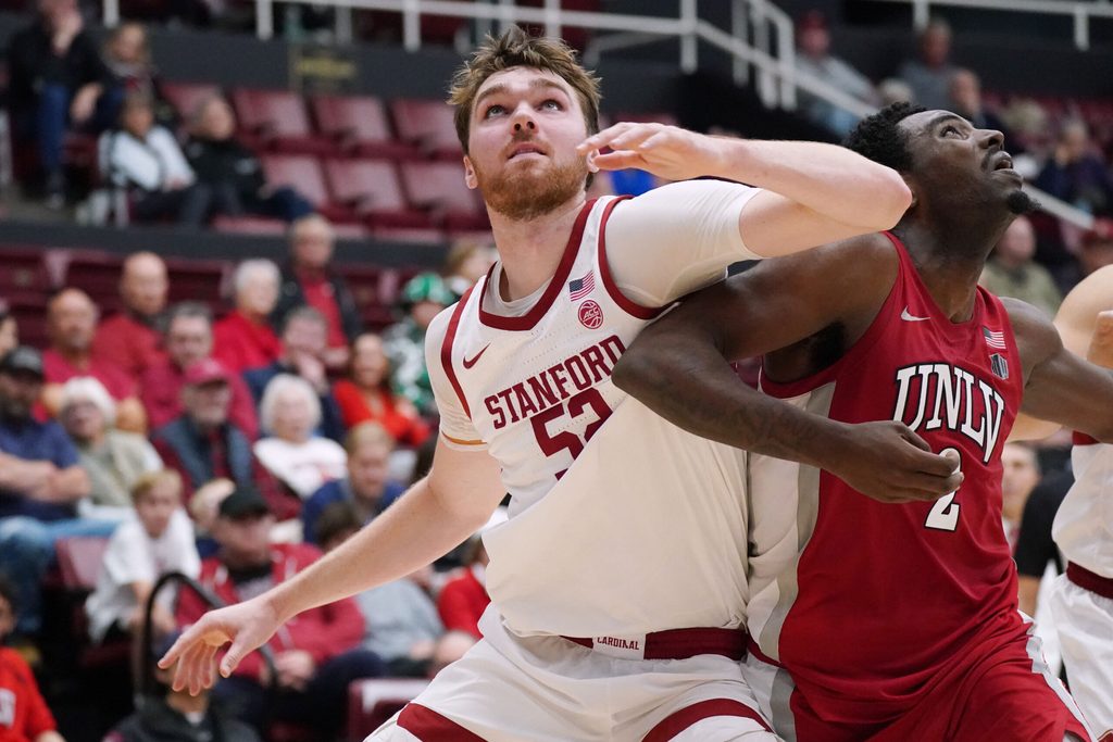 Dec 7, 2025; Stanford, California, USA; Stanford Cardinal forward/center Aidan Cammann (52) boxes out UNLV Runnin' Rebels forward Kimani Hamilton (2) in the second half against the Stanford Cardinal at Maples Pavilion. Mandatory Credit: David Gonzales-Imagn Images