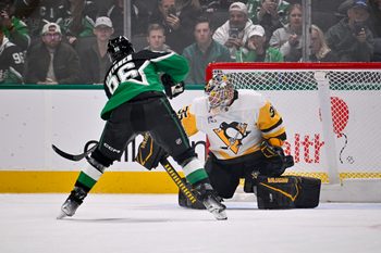 Dec 7, 2025; Dallas, Texas, USA; Dallas Stars right wing Mikko Rantanen (96) scores the game winning goal against Pittsburgh Penguins goaltender Tristan Jarry (35) during the overtime shootout period at American Airlines Center. Mandatory Credit: Jerome Miron-Imagn Images