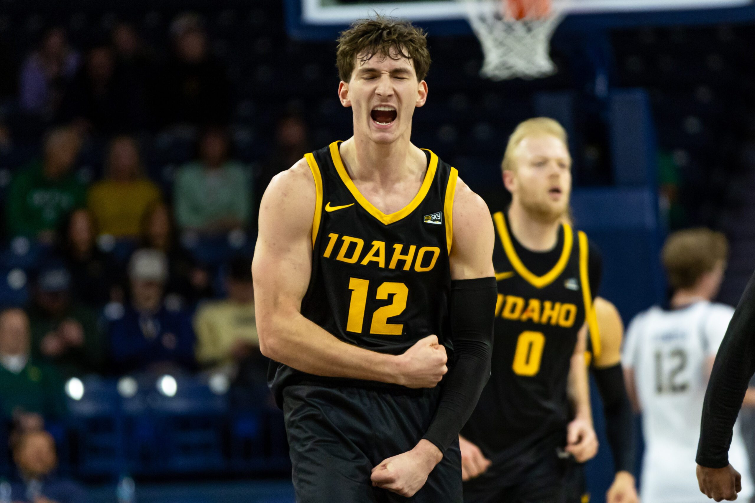 Dec 10, 2025; South Bend, Indiana, USA; Idaho Vandals forward Jackson Rasmussen (12) celebrates after hitting a 3-point shot against the Notre Dame Fighting Irish during the first half at Purcell Pavilion at the Joyce Center. Mandatory Credit: Michael Caterina-Imagn Images