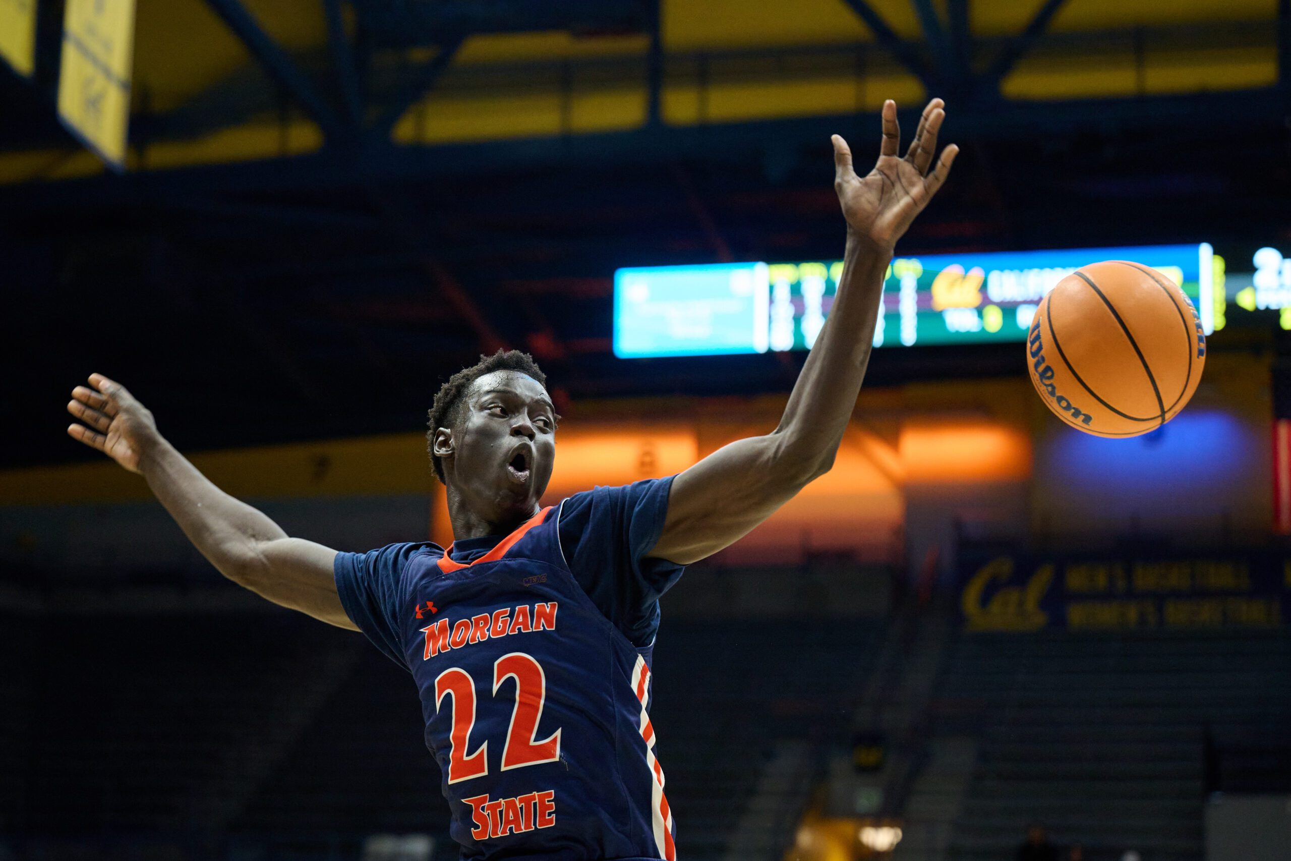 Dec 19, 2025; Berkeley, California, USA; Morgan State Bears forward Manok Lual (22) leaps for a loose ball against the California Golden Bears during the second half at Haas Pavilion. Mandatory Credit: Robert Edwards-Imagn Images