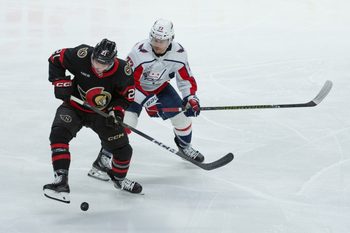 Jan 1, 2026; Ottawa, Ontario, CAN; Ottawa Senators center Nick Cousins (21) and Washington Capitals left wing Anthony Beauvillier (72) battle in the third period at the Canadian Tire Centre. Mandatory Credit: Marc DesRosiers-IMAGN Images