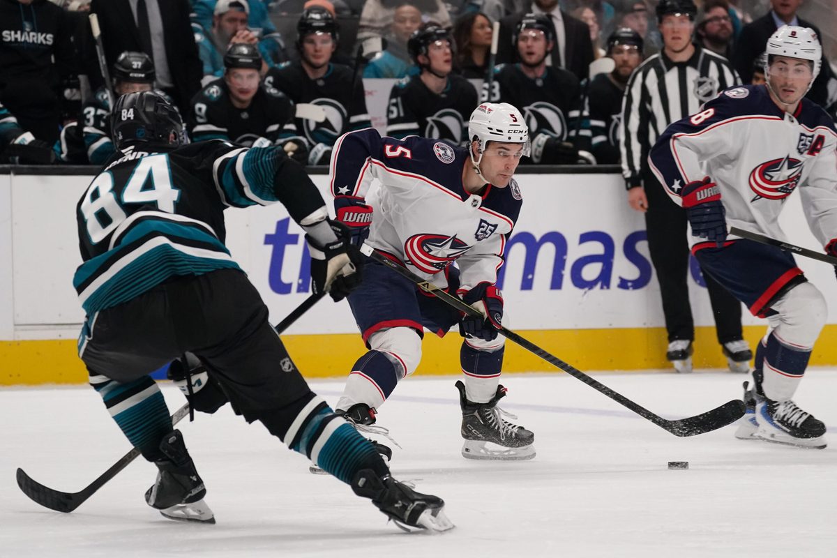 Jan 6, 2026; San Jose, California, USA; Columbus Blue Jackets defenseman Denton Mateychuk (5) looks to pass against San Jose Sharks left wing Pavol Regenda (84) in the third period at SAP Center at San Jose. Mandatory Credit: David Gonzales-Imagn Images