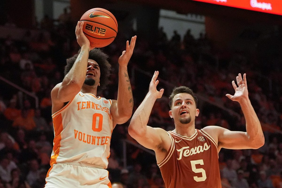 Tennessee guard Ja’Kobi Gillespie (0) tries to get the shot off while guarded by Texas forward Camden Heide (5) in an NCAA college basketball game on January 6, 2026, in Knoxville, Tenn.