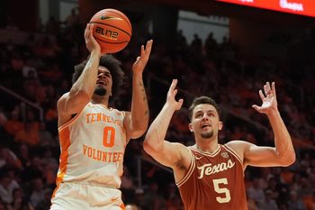 Tennessee guard Ja’Kobi Gillespie (0) tries to get the shot off while guarded by Texas forward Camden Heide (5) in an NCAA college basketball game on January 6, 2026, in Knoxville, Tenn.