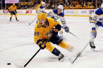 Jan 20, 2026; Nashville, Tennessee, USA;  Nashville Predators right wing Ozzy Weisblatt (89) skates with the puck against the Buffalo Sabres during the third period at Bridgestone Arena. Mandatory Credit: Steve Roberts-Imagn Images