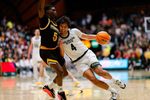 Feb 14, 2026; Fort Collins, Colorado, USA; Colorado State Rams guard Jase Butler (4) controls the ball under pressure from Wyoming Cowboys guard Leland Walker (5) in the second half at Moby Arena. Mandatory Credit: Isaiah J. Downing-Imagn Images