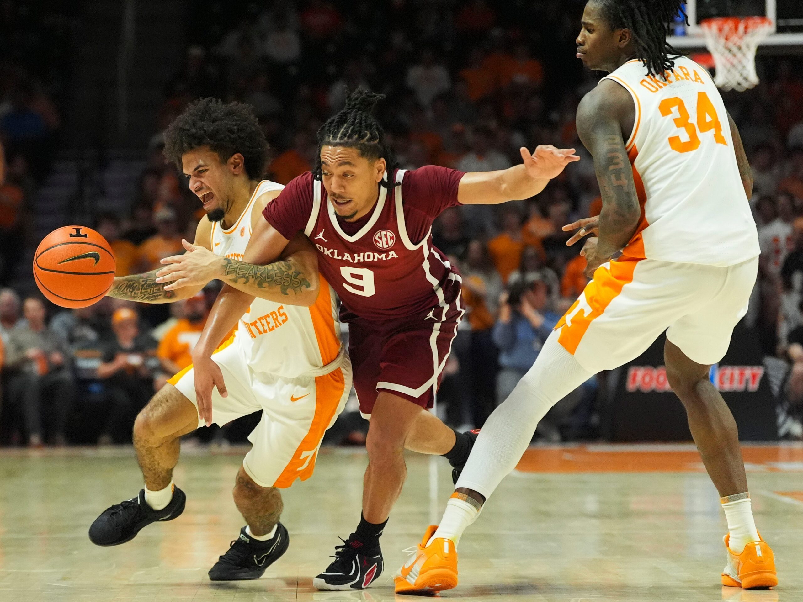 Tennessee guard Ja’Kobi Gillespie (0) moves the ball while guarded by Oklahoma guard Nijel Pack (9) during an NCAA college basketball game on Feb. 18, 2026, in Knoxville, Tennessee.