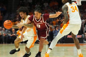 Tennessee guard Ja’Kobi Gillespie (0) moves the ball while guarded by Oklahoma guard Nijel Pack (9) during an NCAA college basketball game on Feb. 18, 2026, in Knoxville, Tennessee.