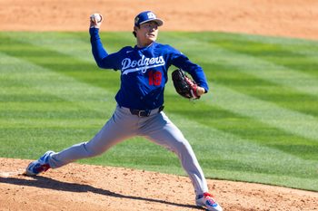 Feb 21, 2026; Tempe, Arizona, USA; Los Angeles Dodgers pitcher Yoshinobu Yamamoto against the Los Angeles Angels during a spring training game at Tempe Diablo Stadium. Mandatory Credit: Mark J. Rebilas-Imagn Images
