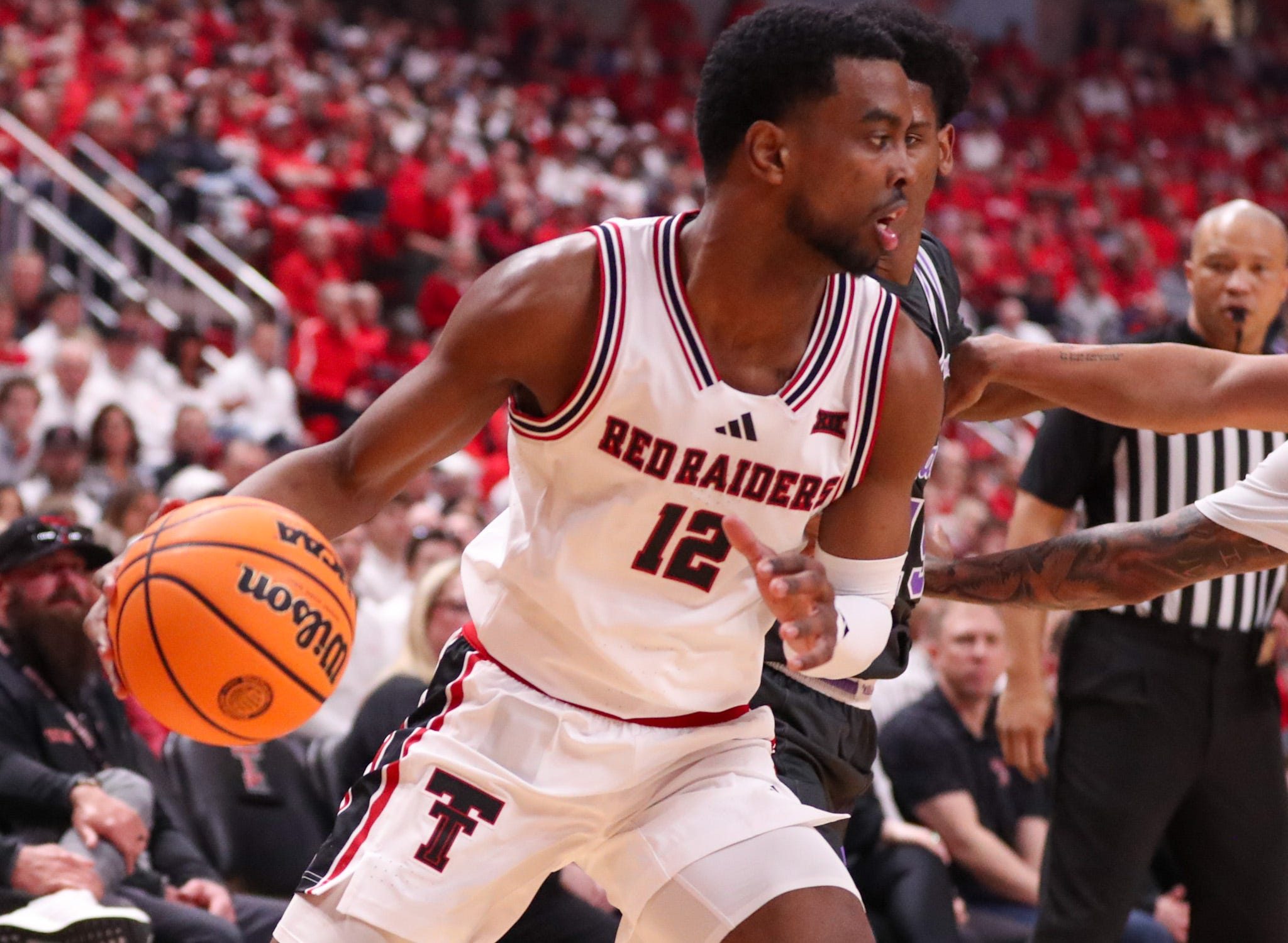 Texas Tech's Donovan Atwell handles the ball against Kansas State during a Big 12 Conference men's basketball game, Saturday, Feb. 21, 2026, in United Supermarkets Arena.