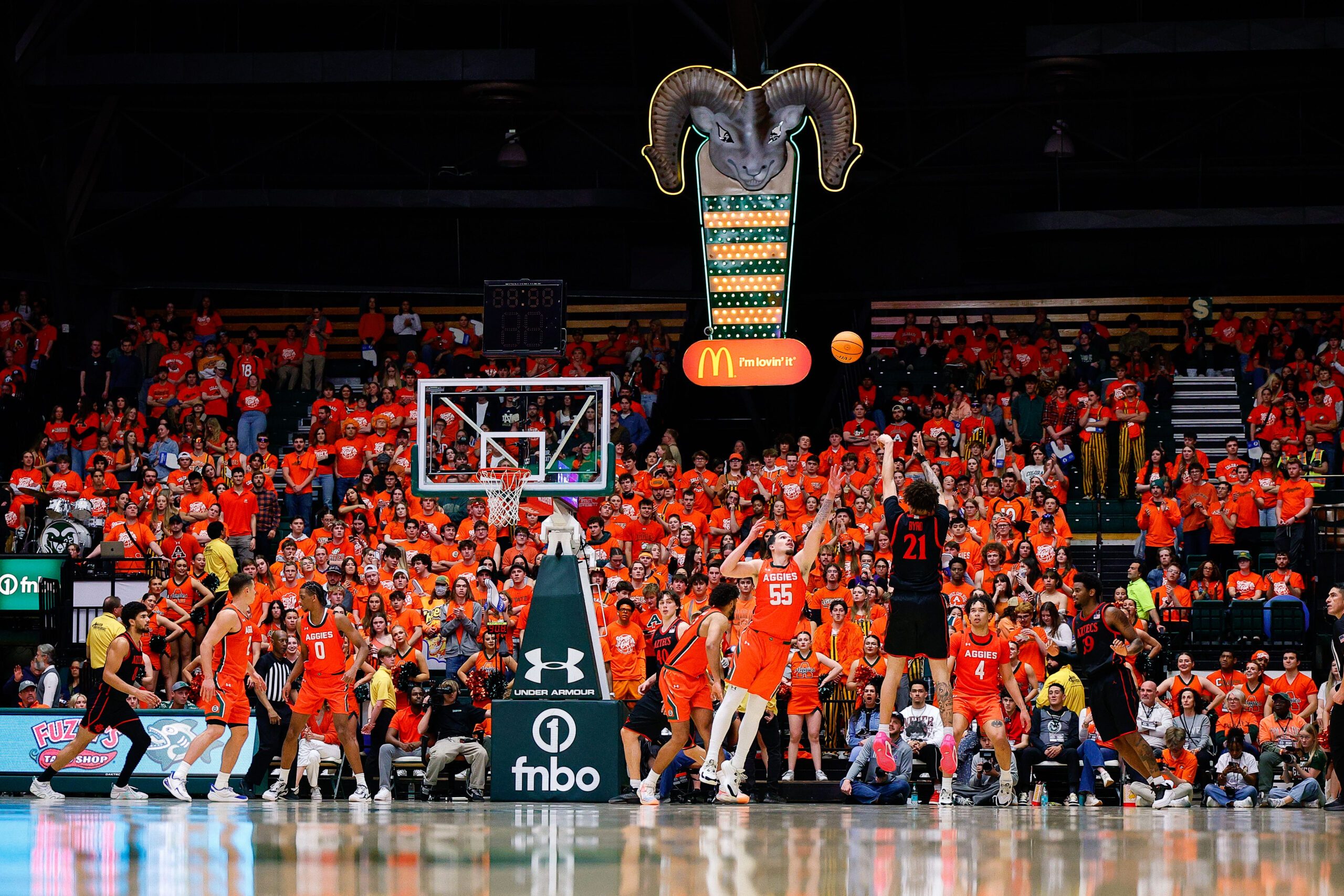 Feb 21, 2026; Fort Collins, Colorado, USA; San Diego State Aztecs guard Miles Byrd (21) attempts a shot as Colorado State Rams forward Jevin Muniz (55) defends in the second half at Moby Arena. Mandatory Credit: Isaiah J. Downing-Imagn Images