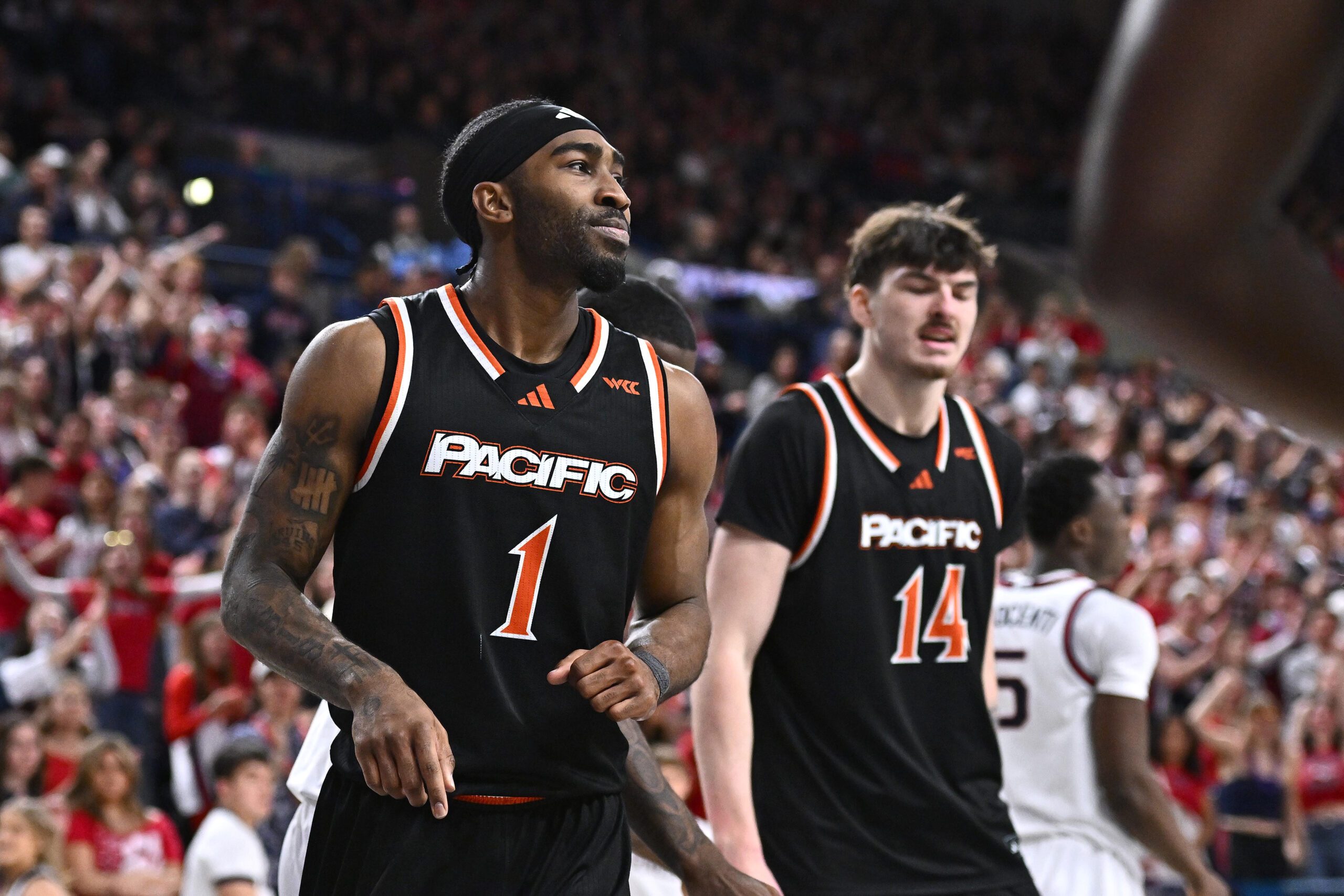 Feb 21, 2026; Spokane, Washington, USA; Pacific Tigers guard Justin Rochelin (1) reacts after a play against the Gonzaga Bulldogs in the second half at McCarthey Athletic Center. Gonzaga Bulldogs won 71-62. Mandatory Credit: James Snook-Imagn Images