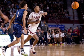 NMSU’s Jemel Jones (21) makes a pass during a game against UTEP at the Pan American Center in Las Cruces, New Mexico, on Saturday, Feb. 21, 2026.