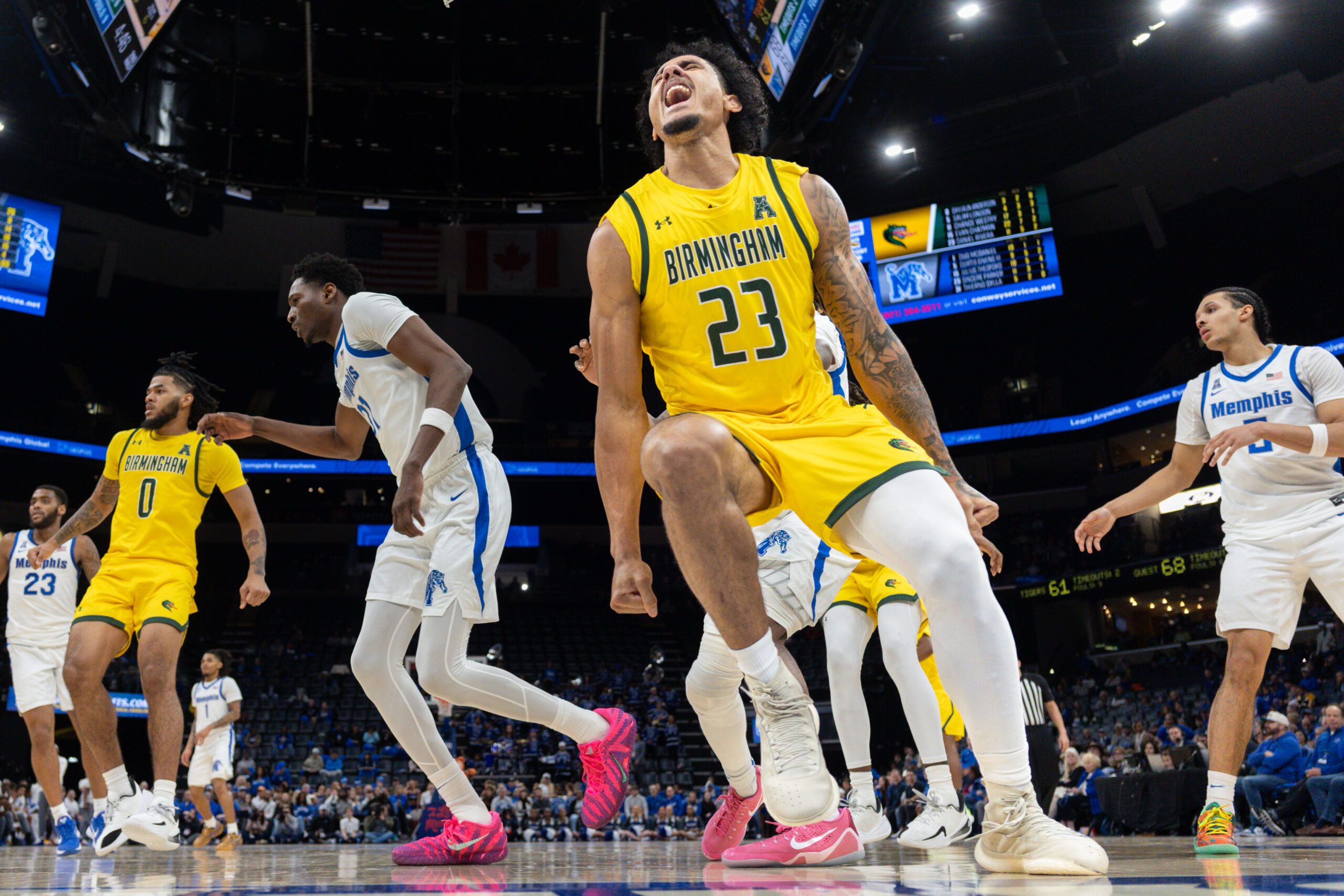 Feb 22, 2026; Memphis, Tennessee, USA; UAB Blazers forward Daniel Rivera (23) reacts after a dunk against the Memphis Tigers during the second half at FedExForum. Mandatory Credit: Wesley Hale-Imagn Images