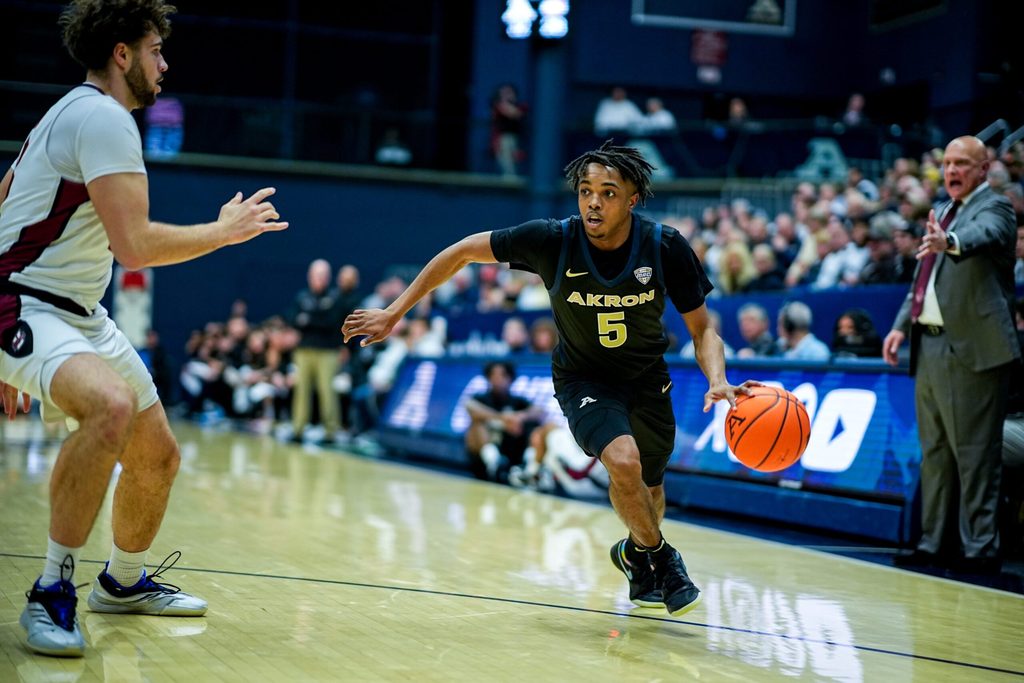 Akron Zips’ Tavari Johnson (5) dribbles in a home game against UMass, Feb. 13, 2026.