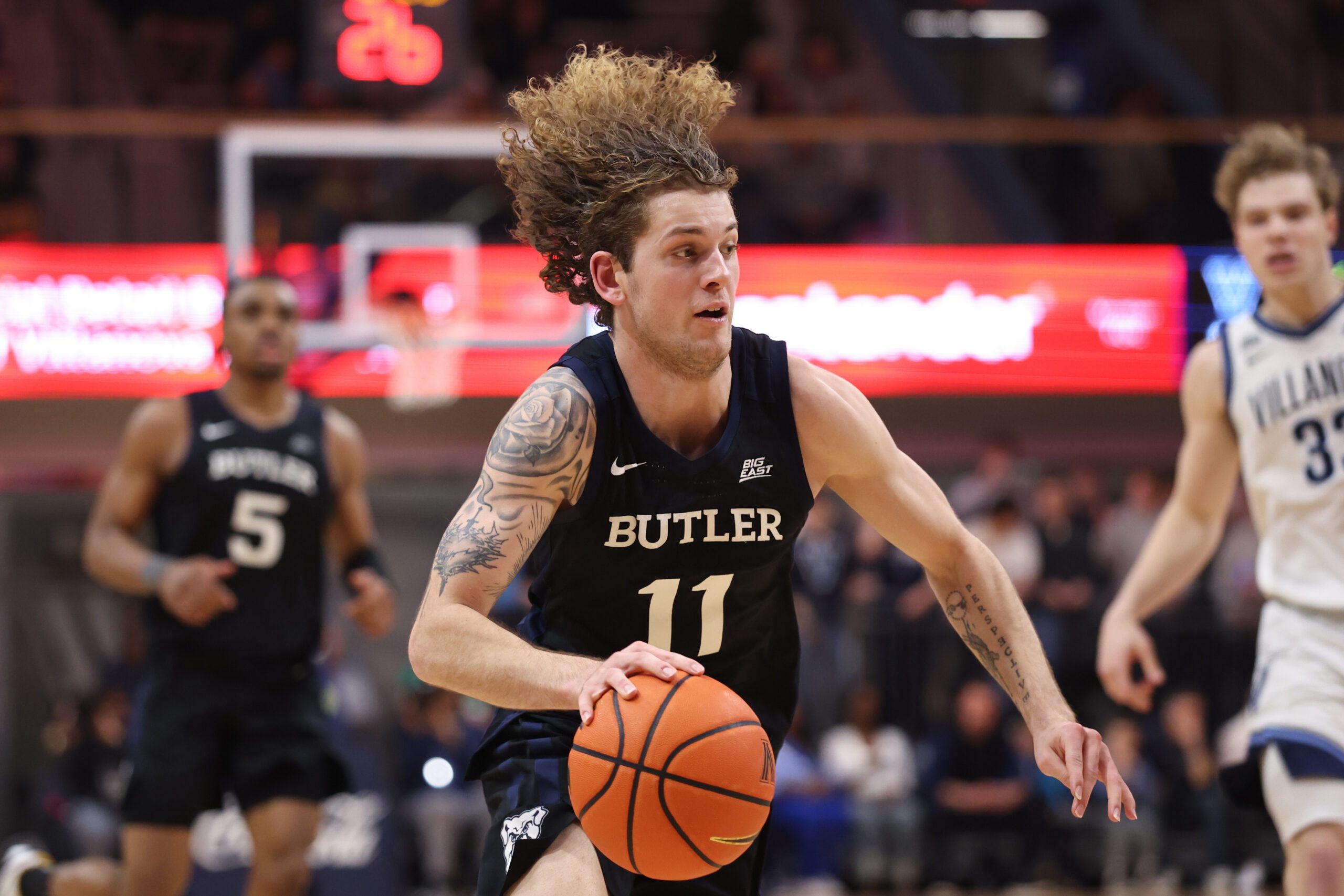 Feb 25, 2026; Villanova, Pennsylvania, USA; Butler Bulldogs guard Finley Bizjack (11) drives against the Villanova Wildcats during the second half at William B. Finneran Pavilion. Mandatory Credit: Bill Streicher-Imagn Images