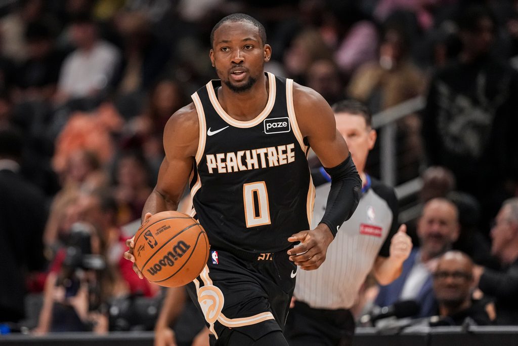 Feb 26, 2026; Atlanta, Georgia, USA; Atlanta Hawks forward Jonathan Kuminga (0) brings the ball up the court against the Washington Wizards during the second half at State Farm Arena. Mandatory Credit: Dale Zanine-Imagn Images