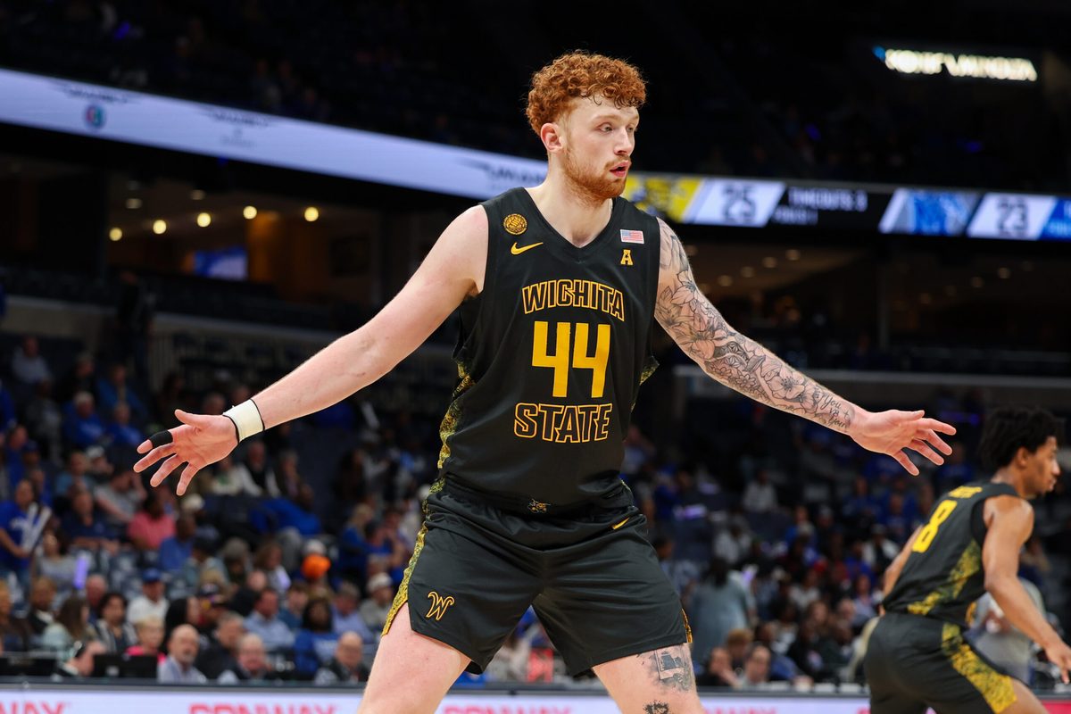 Feb 26, 2026; Memphis, Tennessee, USA; Wichita State Shockers center Will Berg (44) guards against the Memphis Tigers during the first half at FedExForum. Mandatory Credit: Wesley Hale-Imagn Images