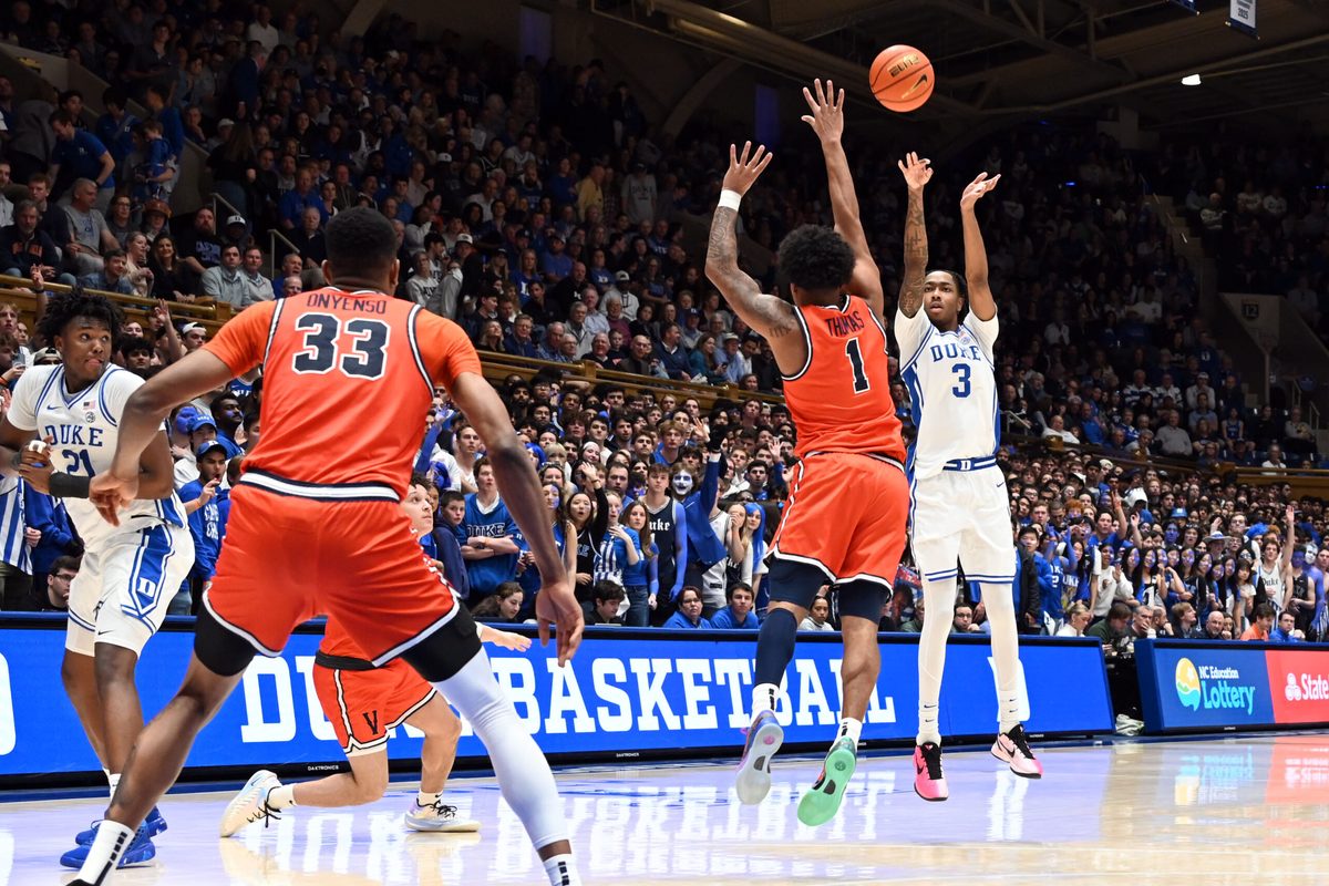 Feb 28, 2026; Durham, North Carolina, USA; Duke Blue Devils forward Isaiah Evans (3) shoots over Virginia Cavaliers guard Malik Thomas (1) during the second half at Cameron Indoor Stadium.   Duke won 77-51.  Mandatory Credit: Rob Kinnan-Imagn Images