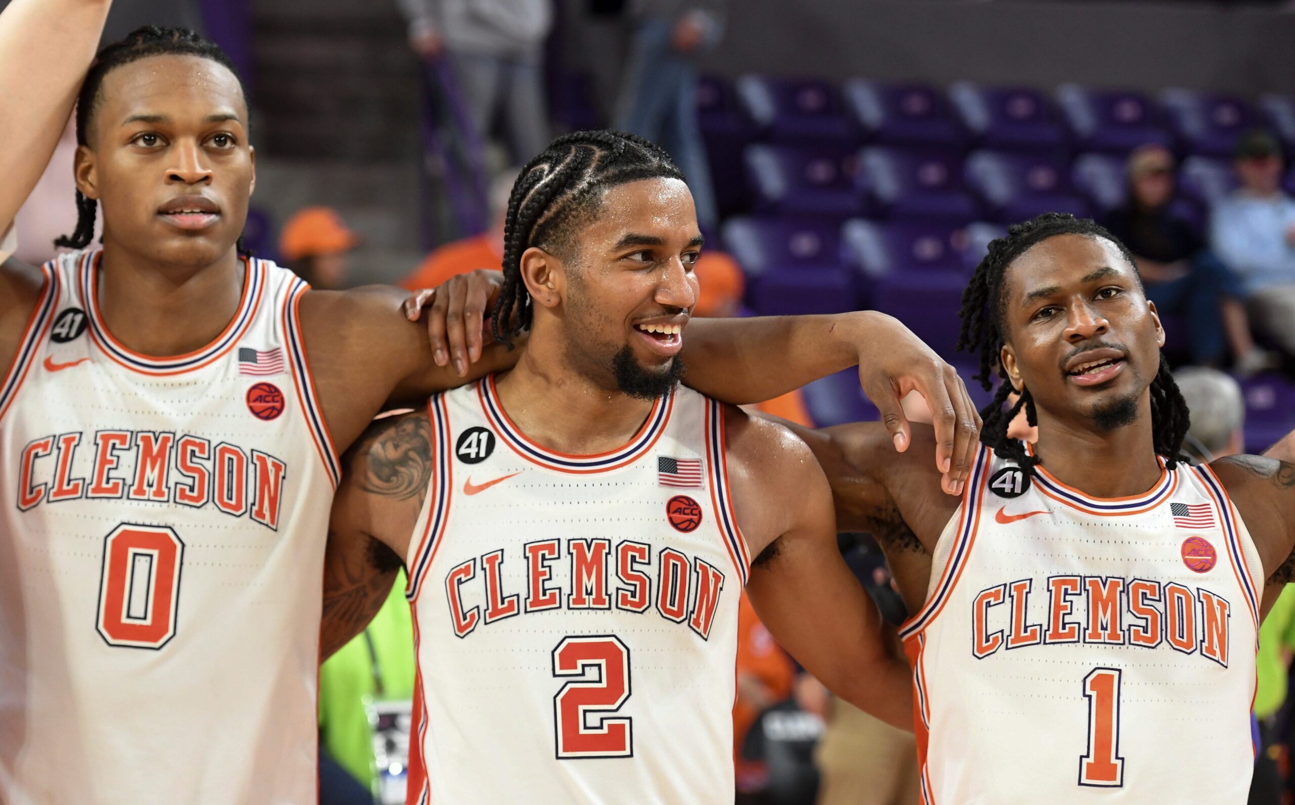 Clemson Tigers forward RJ Godfrey (0), Clemson Tigers guard Dillon Hunter (2) and Clemson Tigers guard Jestin Porter (1) stand together Saturday, Feb. 28, 2026, after the NCAA men’s basketball game against the Louisville Cardinals at Littlejohn Coliseum in Clemson, South Carolina. Clemson Tigers won 80-75.