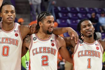 Clemson Tigers forward RJ Godfrey (0), Clemson Tigers guard Dillon Hunter (2) and Clemson Tigers guard Jestin Porter (1) stand together Saturday, Feb. 28, 2026, after the NCAA men’s basketball game against the Louisville Cardinals at Littlejohn Coliseum in Clemson, South Carolina. Clemson Tigers won 80-75.