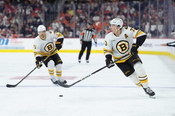 Feb 28, 2026; Philadelphia, Pennsylvania, USA; Boston Bruins defenseman Charlie McAvoy (73) controls the puck against the Philadelphia Flyers in the third period at Xfinity Mobile Arena. Mandatory Credit: Kyle Ross-Imagn Images