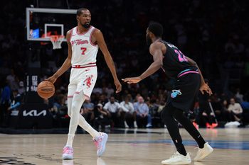 Feb 28, 2026; Miami, Florida, USA; Houston Rockets forward Kevin Durant (7) dribbles the basketball as Miami Heat forward Andrew Wiggins (22) defends during the second quarter at Kaseya Center. Mandatory Credit: Sam Navarro-Imagn Images