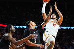 Iowa State Cyclones forward Joshua Jefferson (5) shoots the ball over around Texas Tech Red Raiders forward LeJuan Watts (3) and Texas Tech Red Raiders forward Luke Bamgboye (9) during the second half in the Big-12 conference men’s basketball showdown on Feb. 28, 2026, at Hilton Coliseum in Ames, Iowa.