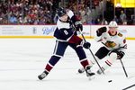 Feb 28, 2026; Denver, Colorado, USA; Colorado Avalanche defenseman Cale Makar (8) shoots the puck in the second period against the Chicago Blackhawks at Ball Arena. Mandatory Credit: Ron Chenoy-Imagn Images