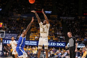 Feb 28, 2026; Morgantown, West Virginia, USA; West Virginia Mountaineers guard Honor Huff (3) shoots during the second half against the BYU Cougars at Hope Coliseum. Mandatory Credit: Ben Queen-Imagn Images