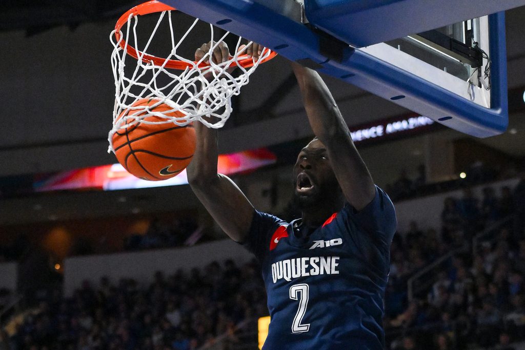 Feb 28, 2026; St. Louis, Missouri, USA; Duquesne Dukes forward David Dixon (2) dunks against the Saint Louis Billikens during the second half at Chaifetz Arena. Mandatory Credit: Jeff Curry-Imagn Images
